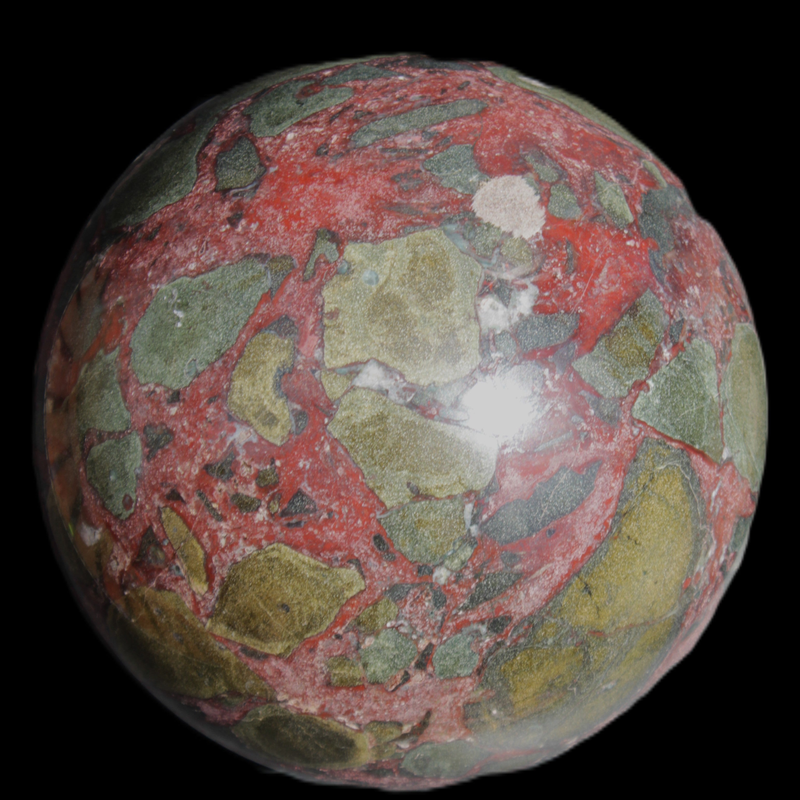 Dragons Blood Stone sphere 143mm 4620g in sunlight - Rocks and Things Store