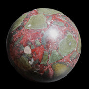 Dragons Blood Stone sphere 143mm 4620g in sunlight - Rocks and Things Store