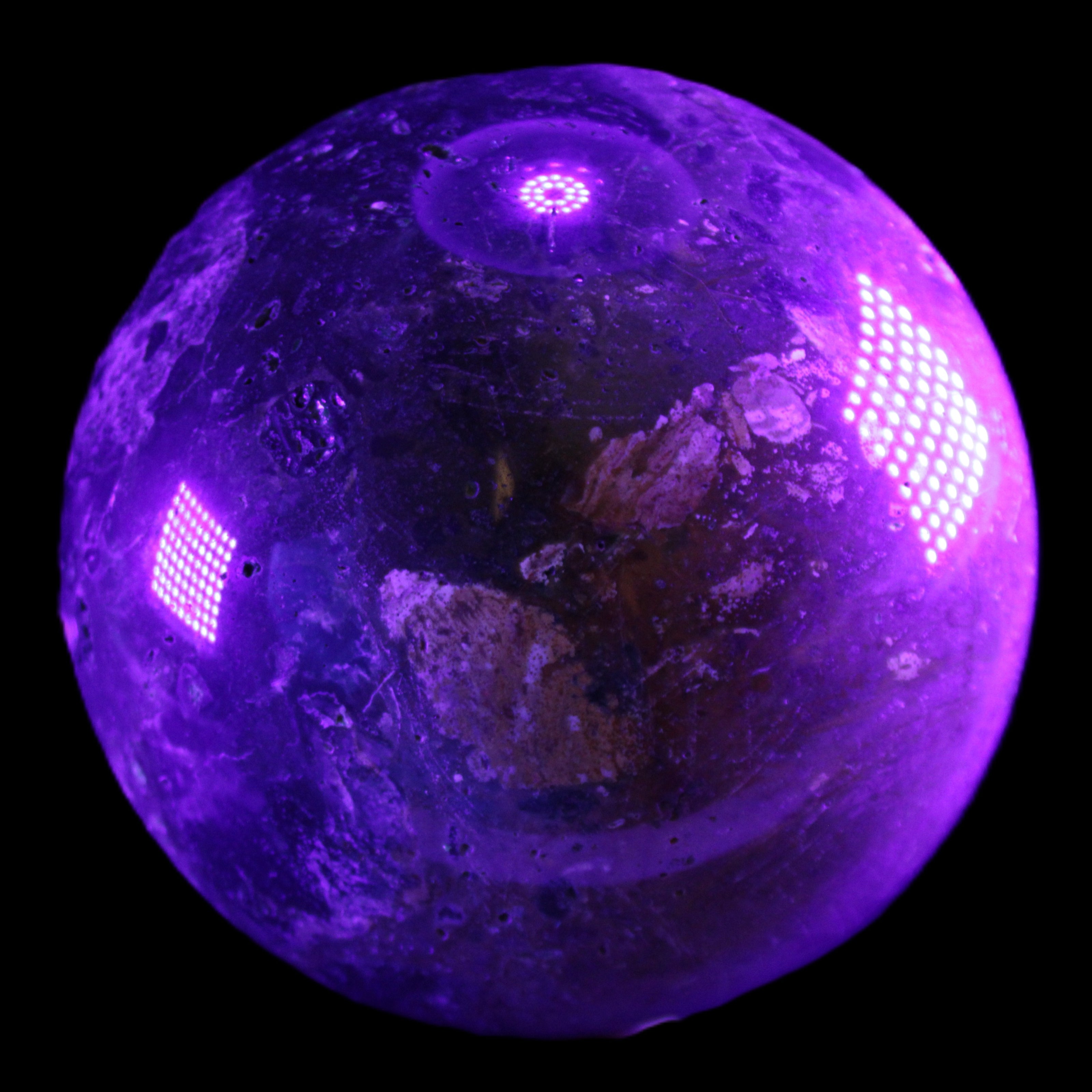 Large Ocean Jasper sphere 129mm 2900g in UV light - Rocks and Things Store