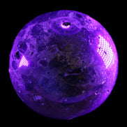 Large Ocean Jasper sphere 129mm 2900g in UV light - Rocks and Things Store