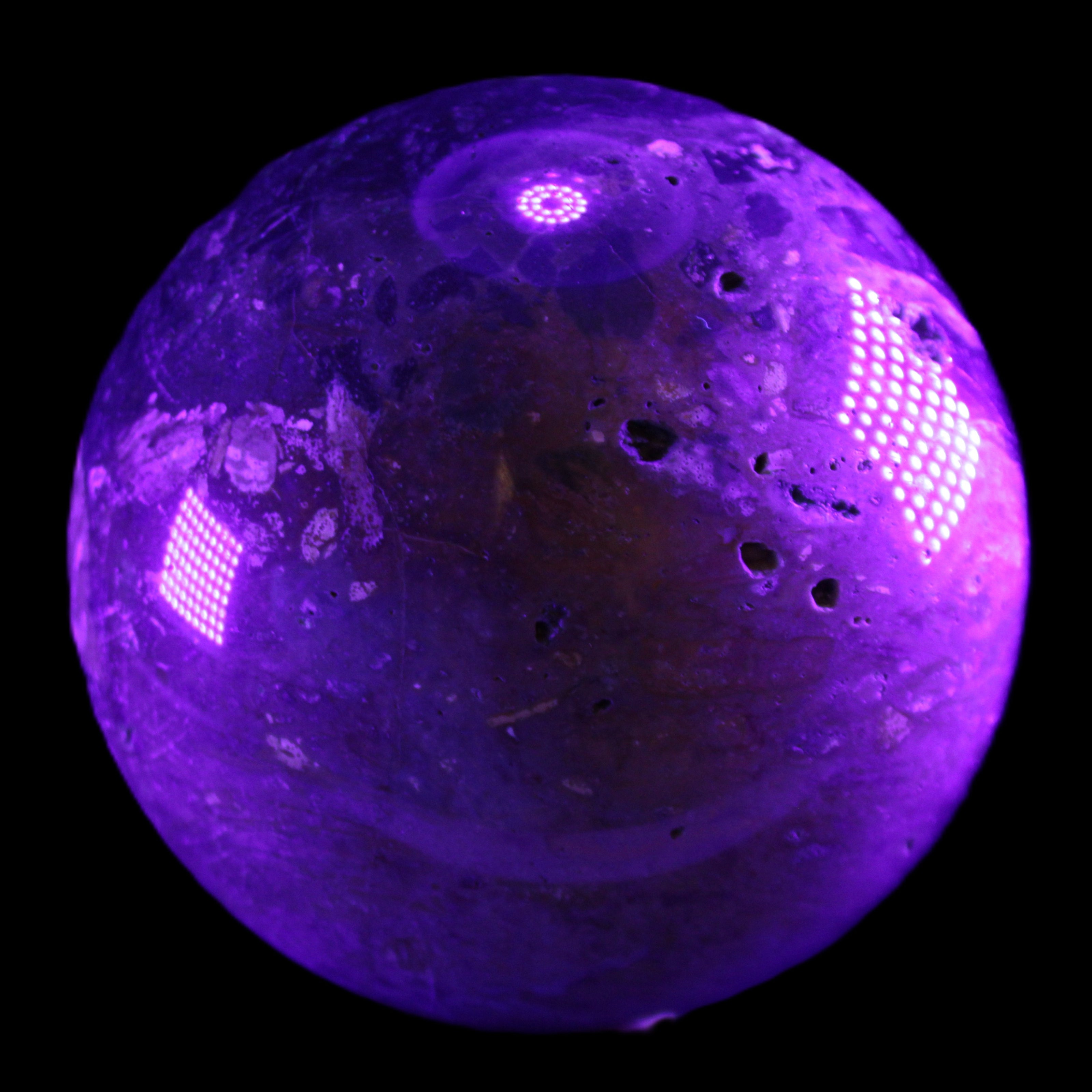 Large Ocean Jasper sphere 129mm 2900g in UV light - Rocks and Things Store