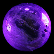 Large Ocean Jasper sphere 129mm 2900g in UV light - Rocks and Things Store