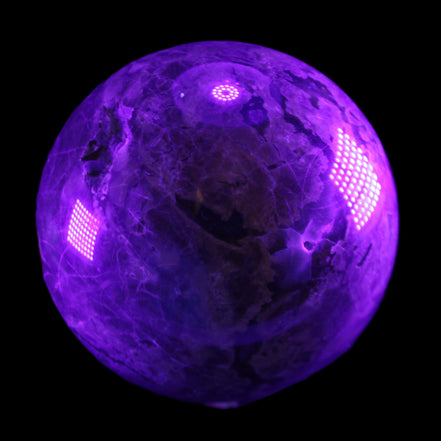Volcano Agate sphere 135mm 3240g in UV light - Rocks and Things Store