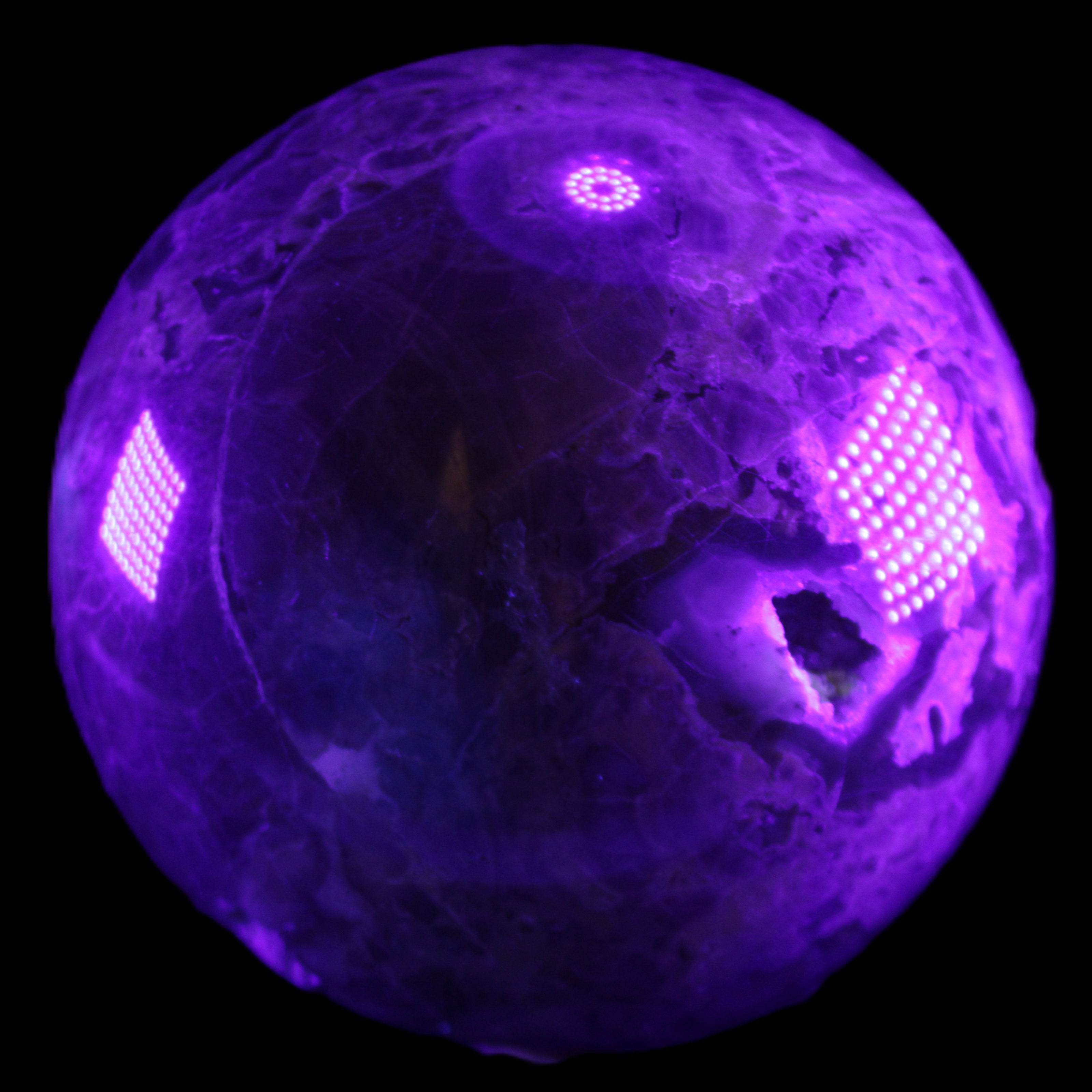 Volcano Agate sphere 135mm 3240g in UV light - Rocks and Things Store