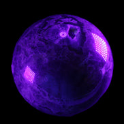 Volcano Agate sphere 135mm 3240g in UV light - Rocks and Things Store