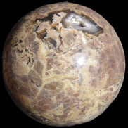Volcano Agate sphere 135mm 3240g in sunlight - Rocks and Things Store