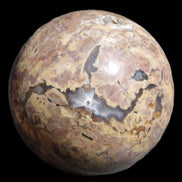Volcano Agate sphere 135mm 3240g in sunlight - Rocks and Things Store