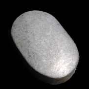 Shungite palmstone 63*40mm 56g in sunlight - Rocks and Things Store