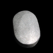 Shungite palmstone 63*40mm 56g in sunlight - Rocks and Things Store