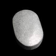 Shungite palmstone 63*40mm 56g in sunlight - Rocks and Things Store