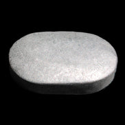 Shungite palmstone 63*40mm 56g in sunlight - Rocks and Things Store