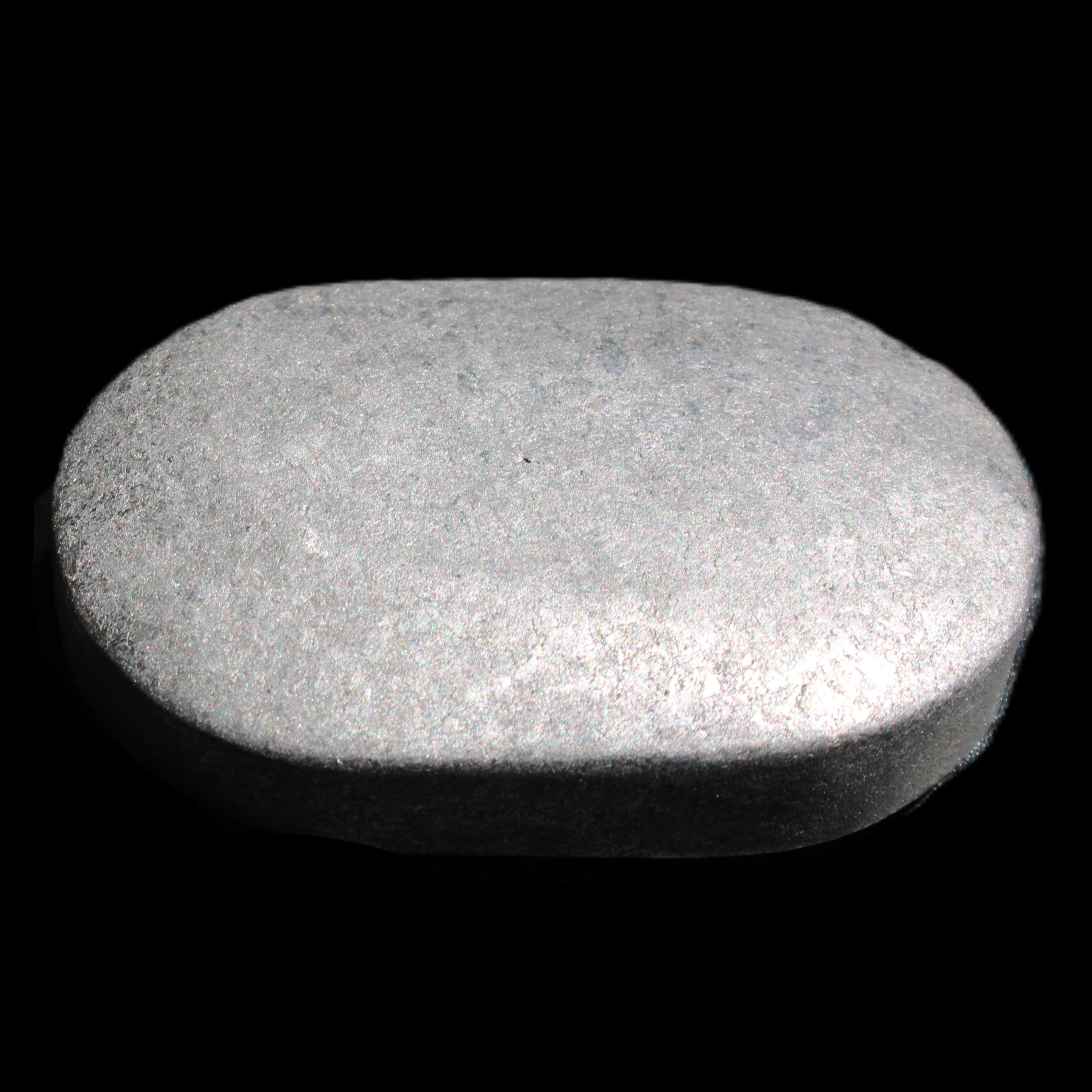 Shungite palmstone 63*40mm 56g in sunlight - Rocks and Things Store