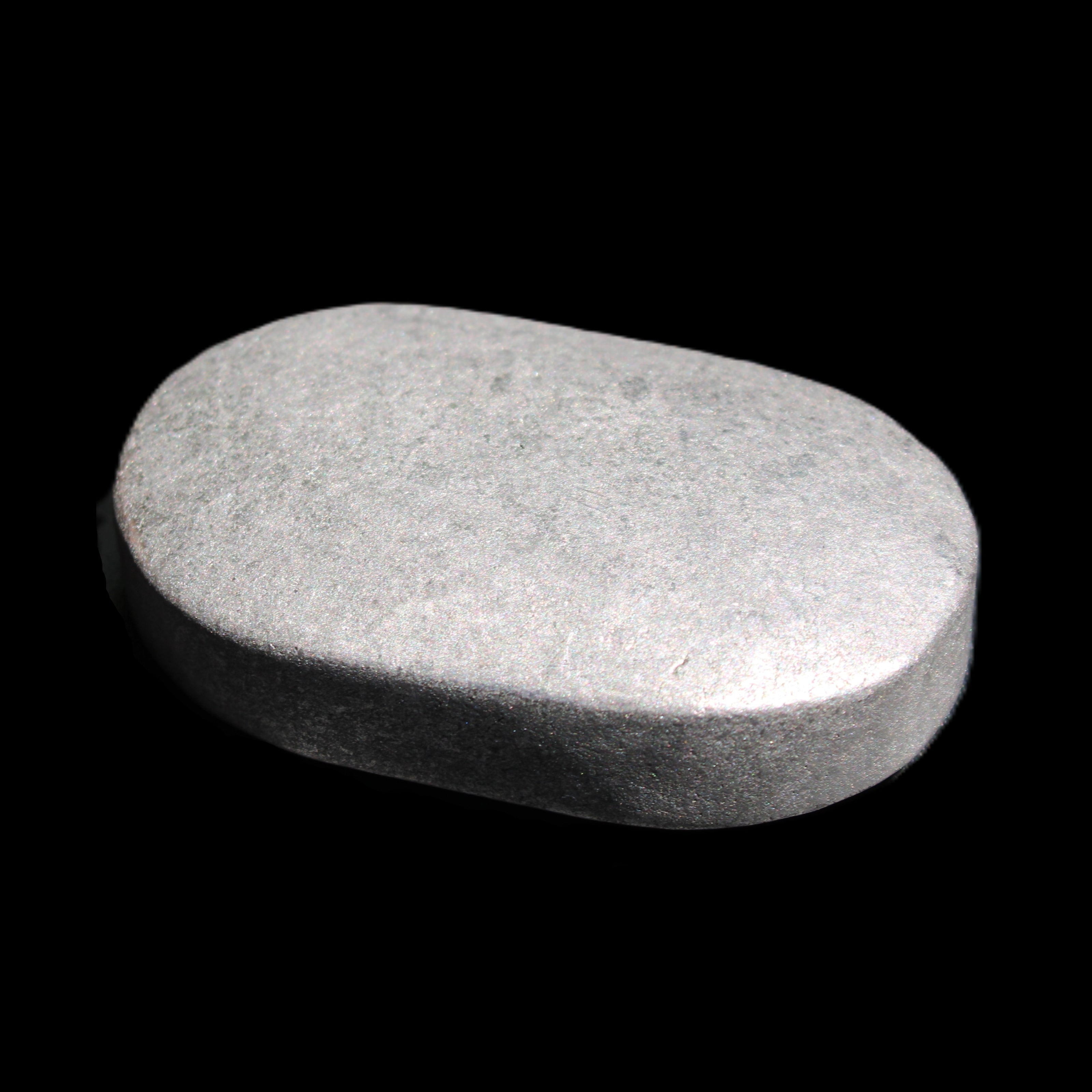 Shungite palmstone 63*40mm 56g in sunlight - Rocks and Things Store