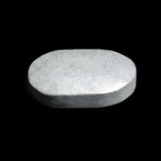 Shungite palmstone 63*40mm 56g in sunlight - Rocks and Things Store