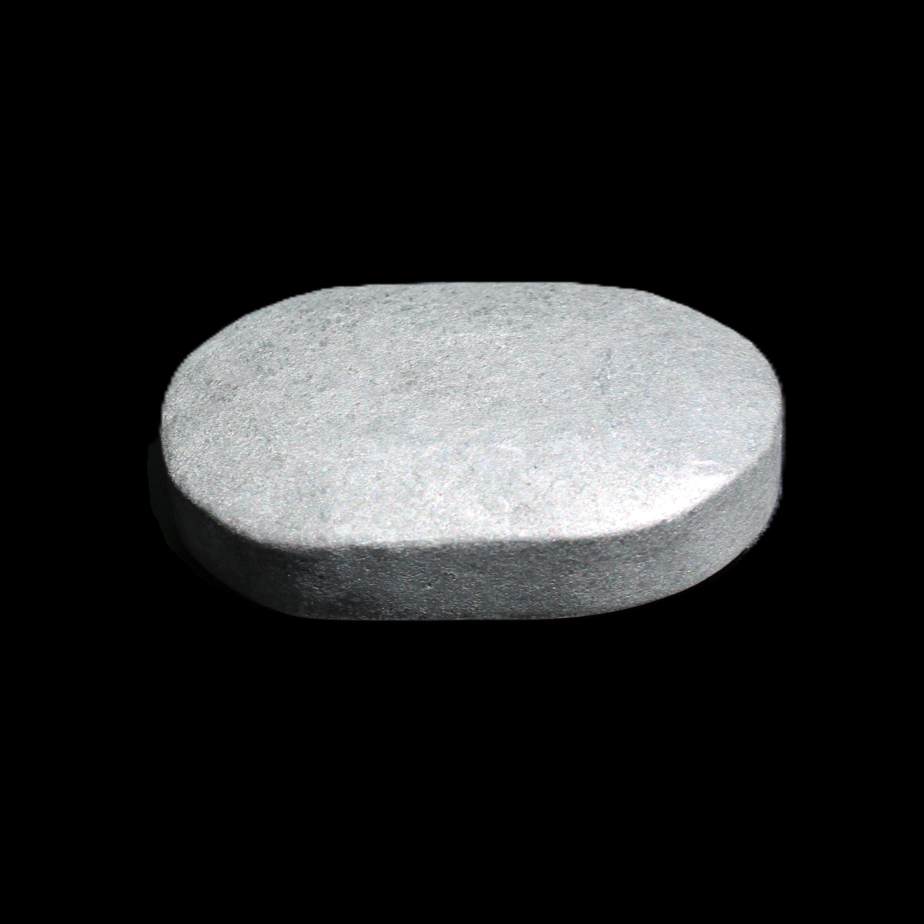 Shungite palmstone 63*40mm 56g in sunlight - Rocks and Things Store