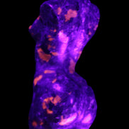 Yooperlite hand carved goddess 38*79mm 135g in UV light - Rocks and Things Store