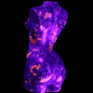 Yooperlite hand carved goddess 38*79mm 135g in UV light - Rocks and Things Store