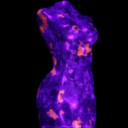 Yooperlite hand carved goddess 38*79mm 135g in UV light - Rocks and Things Store