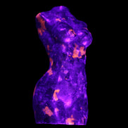 Yooperlite hand carved goddess 38*79mm 135g in UV light - Rocks and Things Store