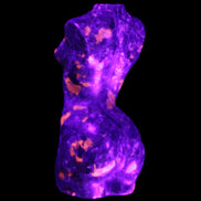 Yooperlite hand carved goddess 38*79mm 135g in UV light - Rocks and Things Store