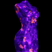 Yooperlite hand carved goddess 38*79mm 135g in UV light - Rocks and Things Store