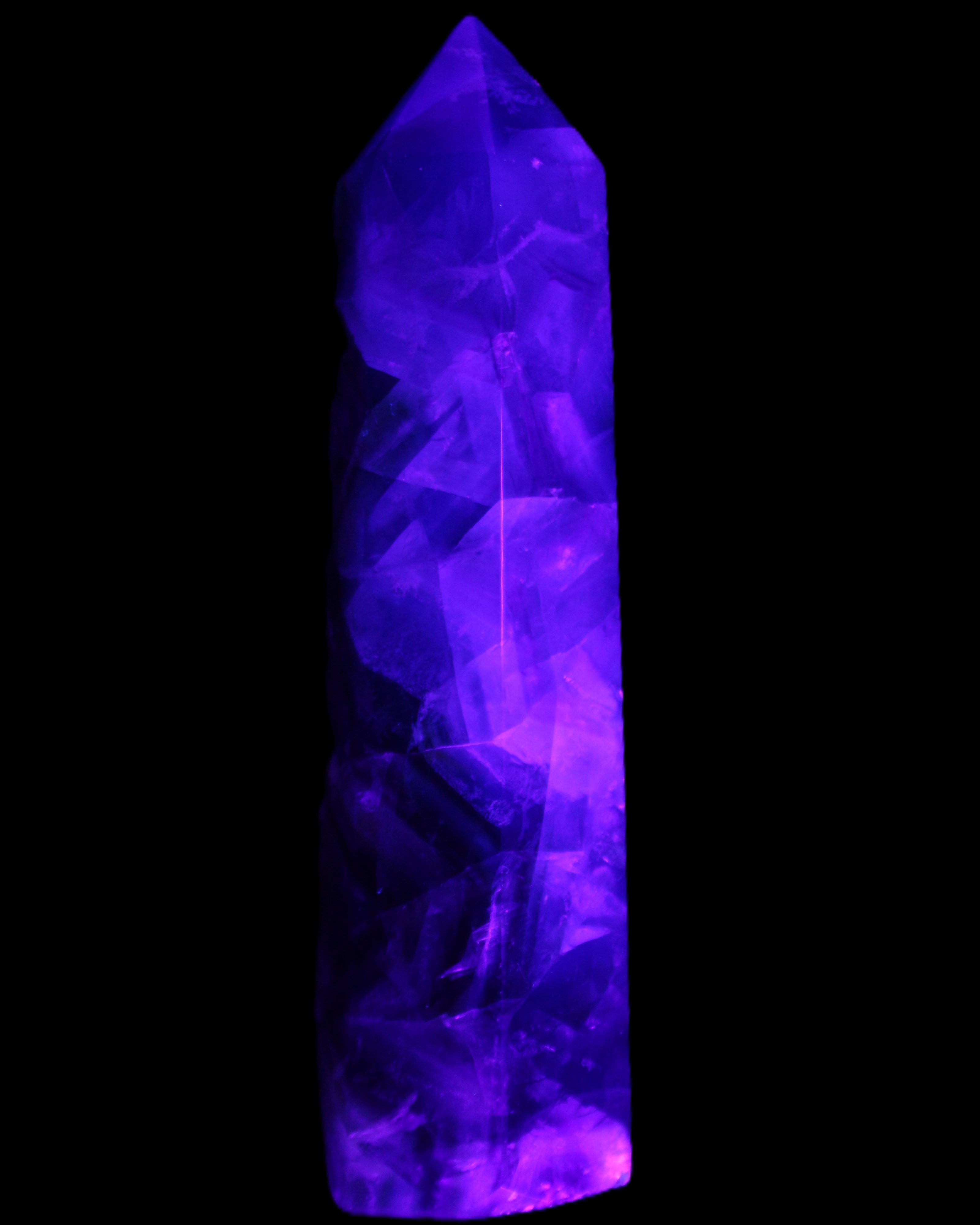Rainbow Fluorite obelisk 116*26*30mm 151g in UV light - Rocks and Things Store