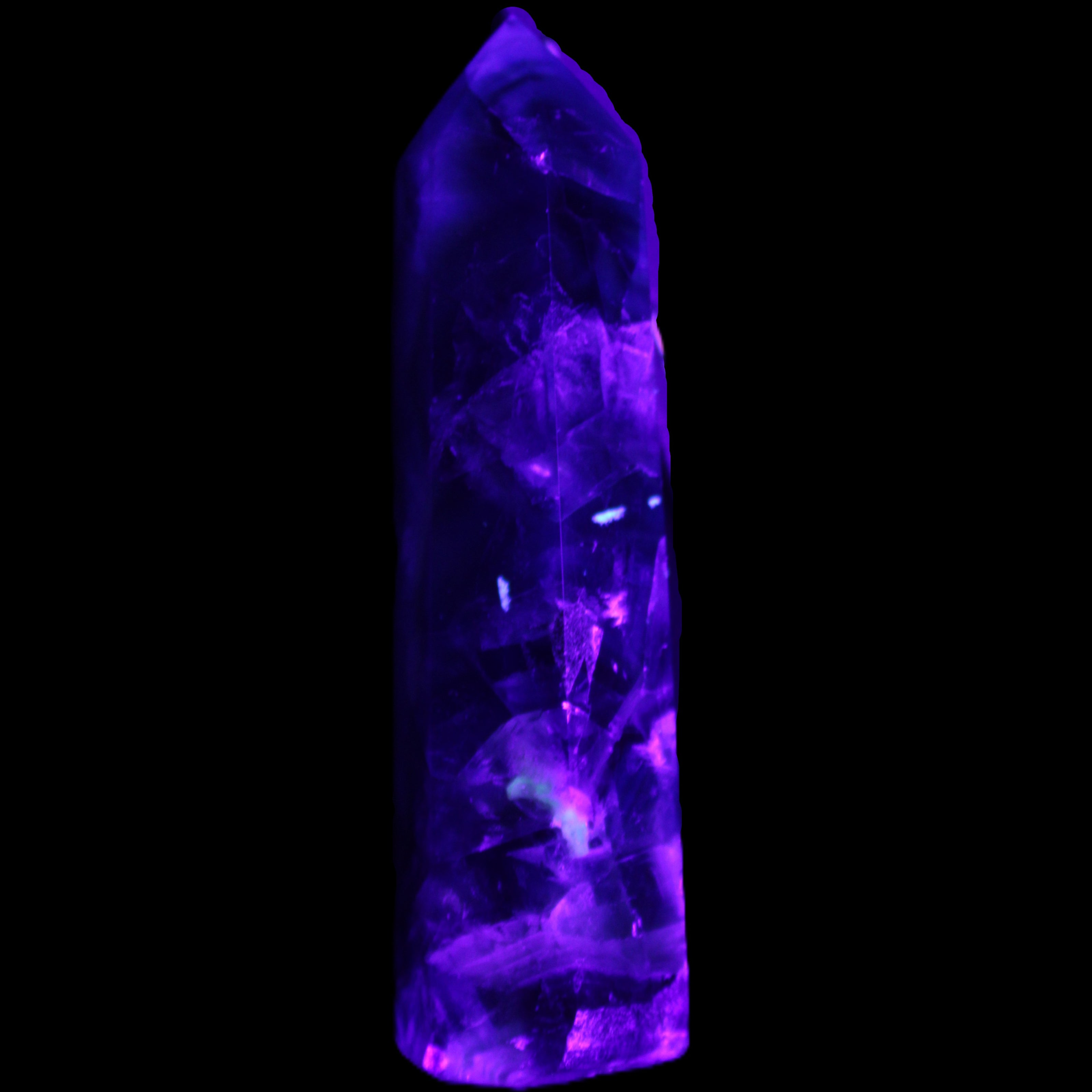 Rainbow Fluorite obelisk 116*26*30mm 151g in UV light - Rocks and Things Store