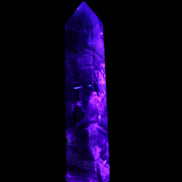 Rainbow Fluorite obelisk 116*26*30mm 151g in UV light - Rocks and Things Store