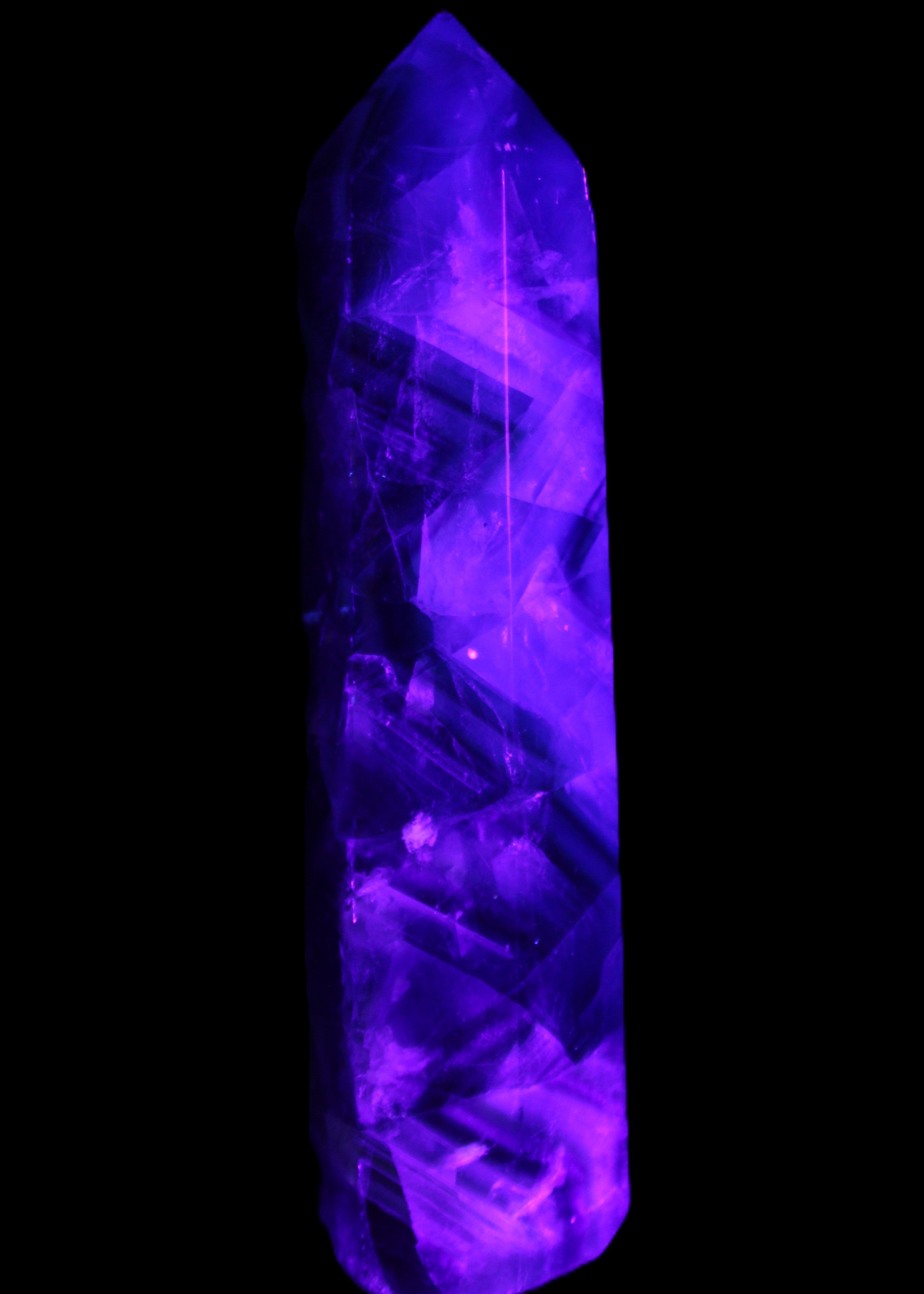 Rainbow Fluorite obelisk 116*26*30mm 151g in UV light - Rocks and Things Store