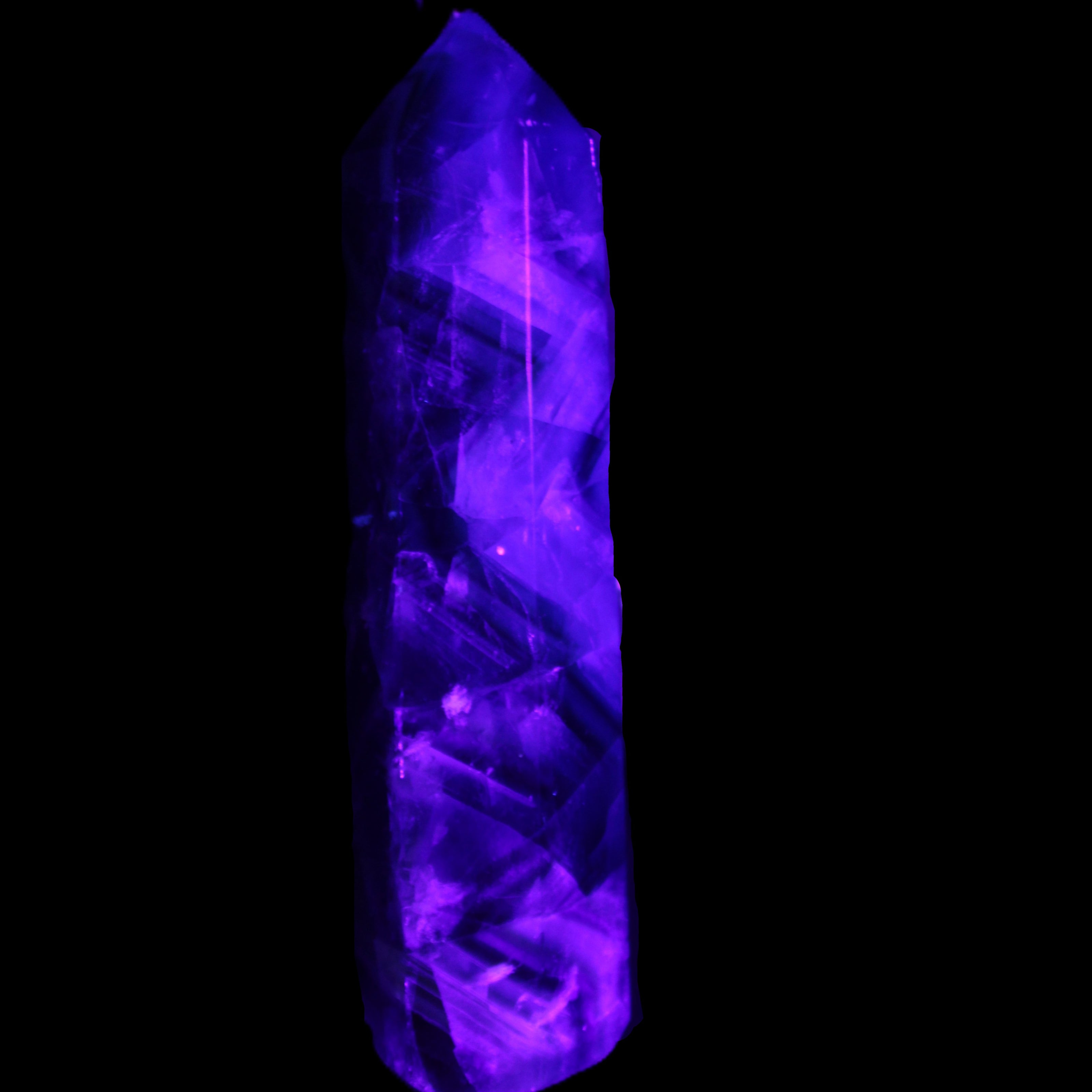 Rainbow Fluorite obelisk 116*26*30mm 151g in UV light - Rocks and Things Store