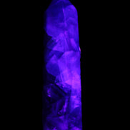 Rainbow Fluorite obelisk 116*26*30mm 151g in UV light - Rocks and Things Store