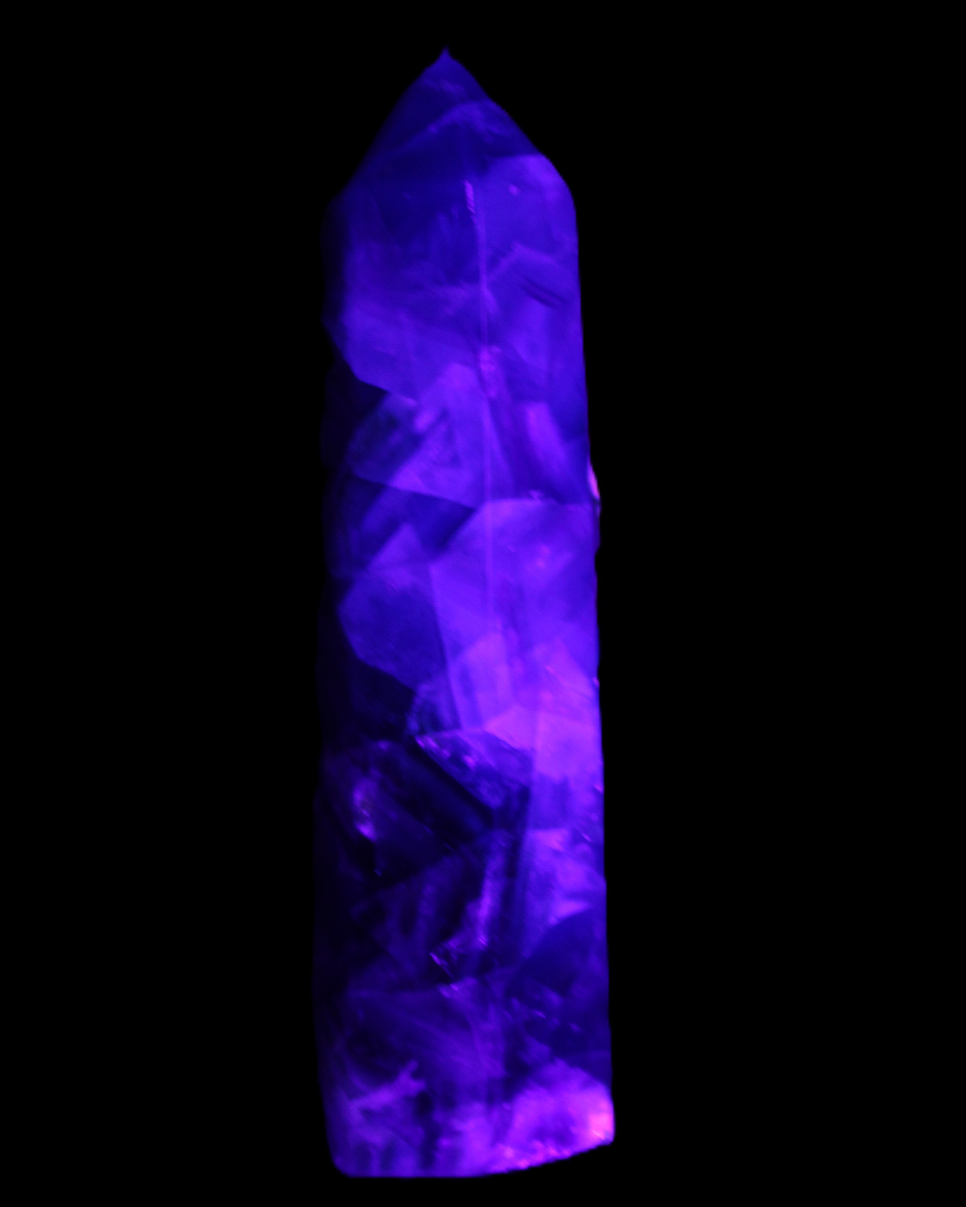 Rainbow Fluorite obelisk 116*26*30mm 151g in UV light - Rocks and Things Store
