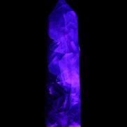 Rainbow Fluorite obelisk 116*26*30mm 151g in UV light - Rocks and Things Store