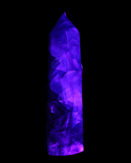 Rainbow Fluorite obelisk 116*26*30mm 151g in UV light - Rocks and Things Store