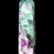 Rainbow Fluorite obelisk 116*26*30mm 151g in sunlight - Rocks and Things Store