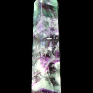 Rainbow Fluorite obelisk 116*26*30mm 151g in sunlight - Rocks and Things Store