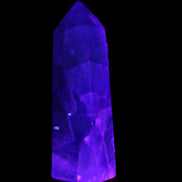Rainbow Fluorite obelisk 89*30*32mm 170g in UV light - Rocks and Things Store