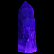 Rainbow Fluorite obelisk 89*30*32mm 170g in UV light - Rocks and Things Store