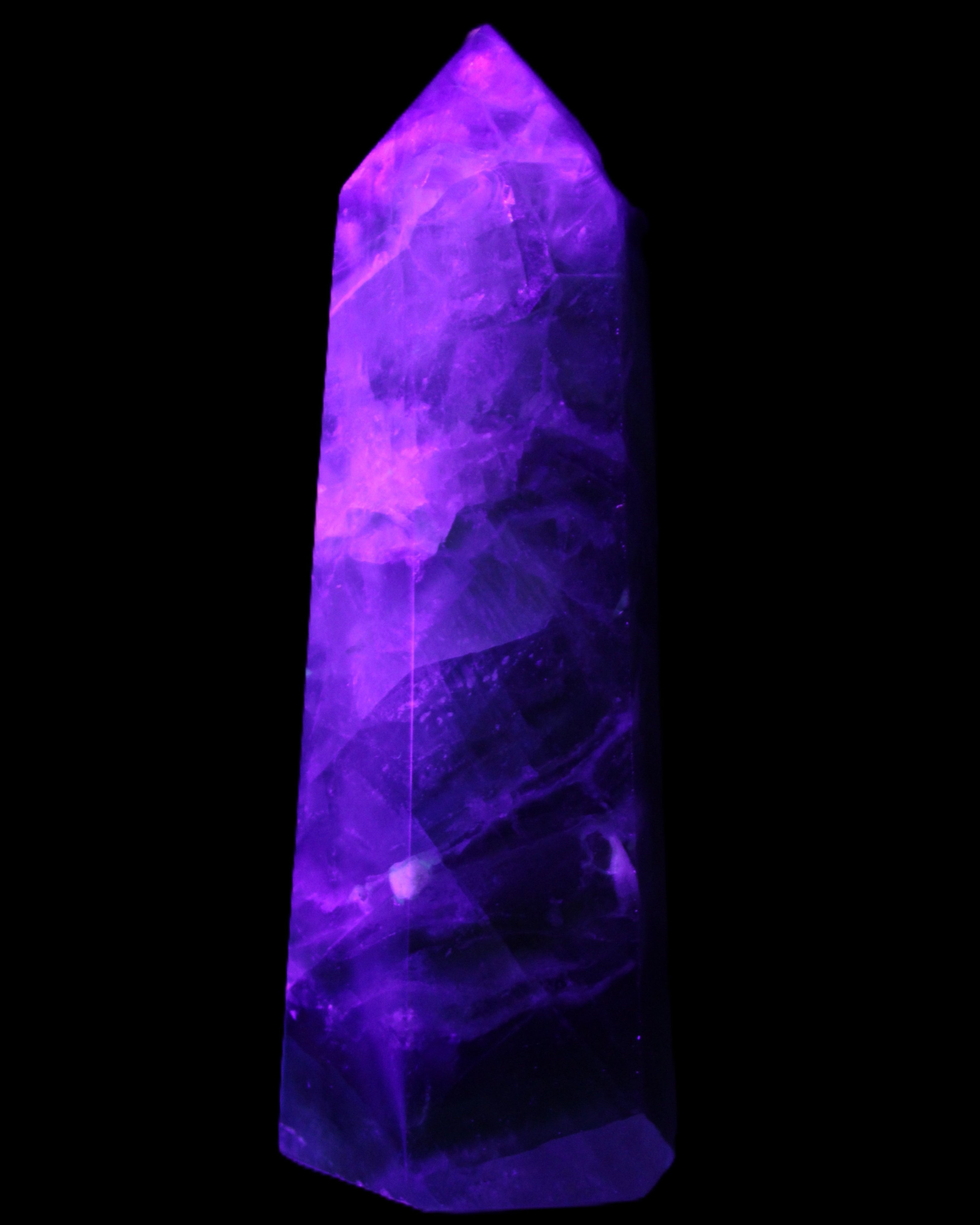Rainbow Fluorite obelisk 99*32*36mm 191g in UV light - Rocks and Things Store
