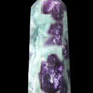 Rainbow Fluorite obelisk 95*29*34mm 170g in UV light - Rocks and Things Store