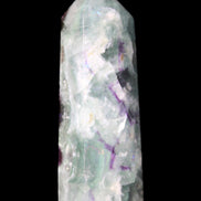 Rainbow Fluorite obelisk 95*29*34mm 170g in UV light - Rocks and Things Store