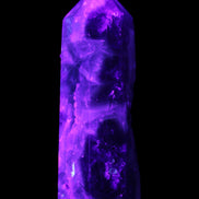 Rainbow Fluorite obelisk 95*29*34mm 170g in UV light - Rocks and Things Store