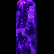 Rainbow Fluorite obelisk 95*29*34mm 170g in UV light - Rocks and Things Store