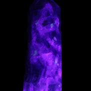 Rainbow Fluorite obelisk 95*29*34mm 170g in UV light - Rocks and Things Store