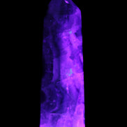Rainbow Fluorite obelisk 95*29*34mm 170g in UV light - Rocks and Things Store