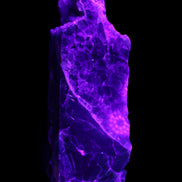 Fluorite obelisk 221*77*40mm 1410g in UV light - Rocks and Things Store
