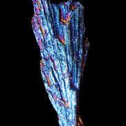 Titanium electroplated Tourmaline feather crystal 12-15g in sunlight - Rocks and Things Store