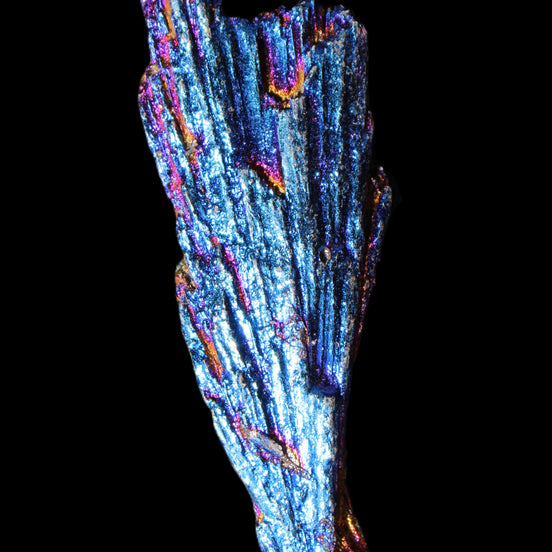 Titanium electroplated Tourmaline feather crystal 12-15g in sunlight - Rocks and Things Store