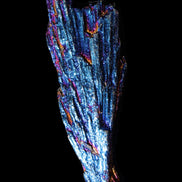 Titanium electroplated Tourmaline feather crystal 12-15g in sunlight - Rocks and Things Store