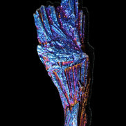 Titanium electroplated Tourmaline feather crystal 12-15g in sunlight - Rocks and Things Store